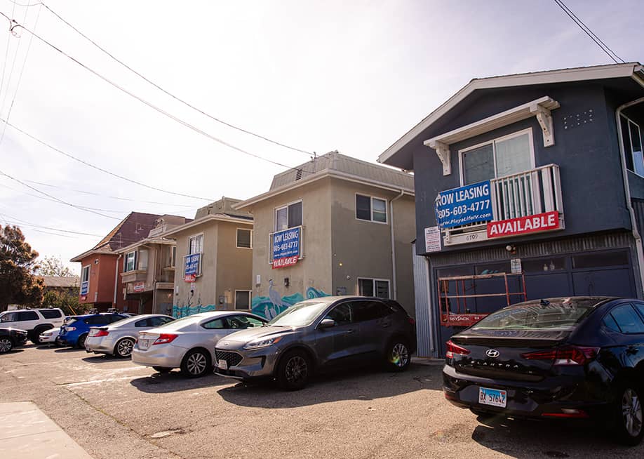 A row of units for leasing in a residential street in the student town of Isla Vista in California. — bluestork // Shutterstock