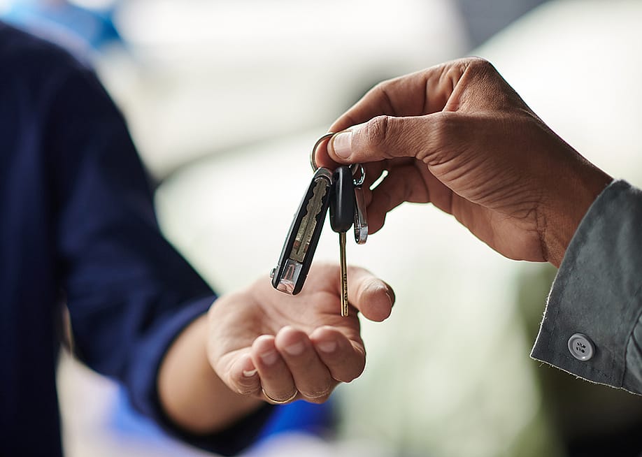 Car keys passed on to an owner. — Dragon Images // Shutterstock