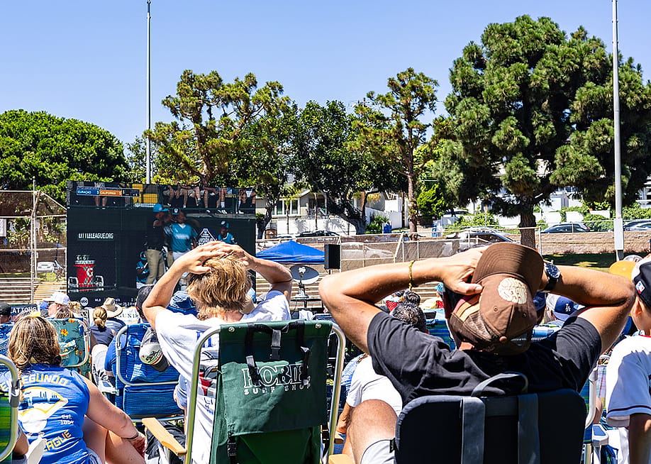 Audience put their hands on their heads in shock at the 2023 Little League World Series in El Segundo, California. — Taylor Media // Shutterstock