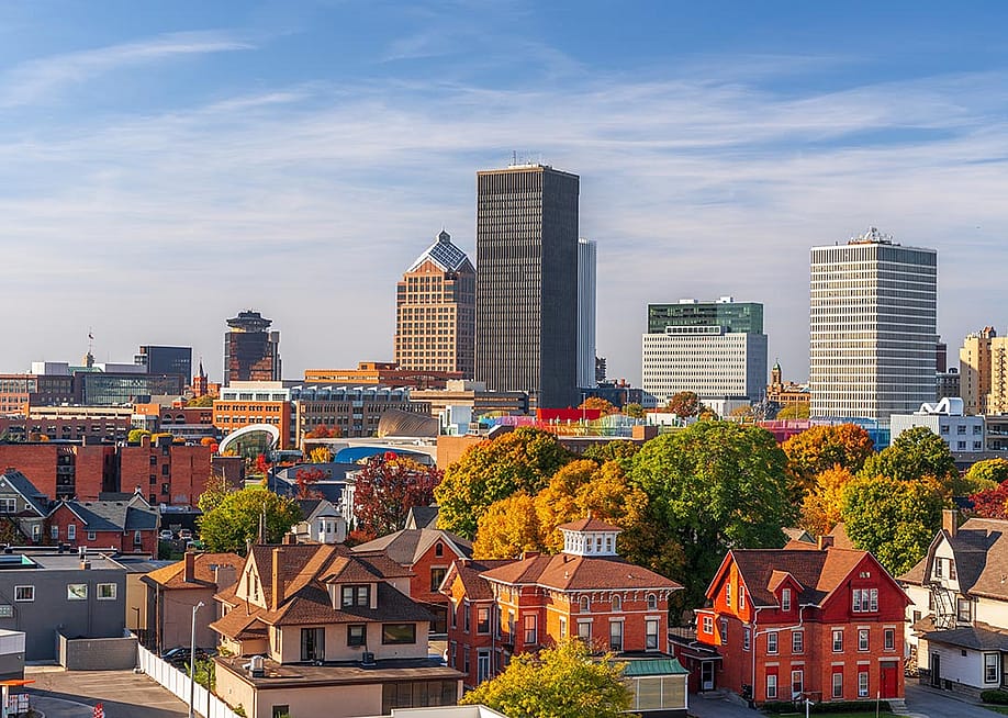 Rochester, New York, USA downtown city skyline colorful in early autumn season. — Sean Pavone // Shutterstock