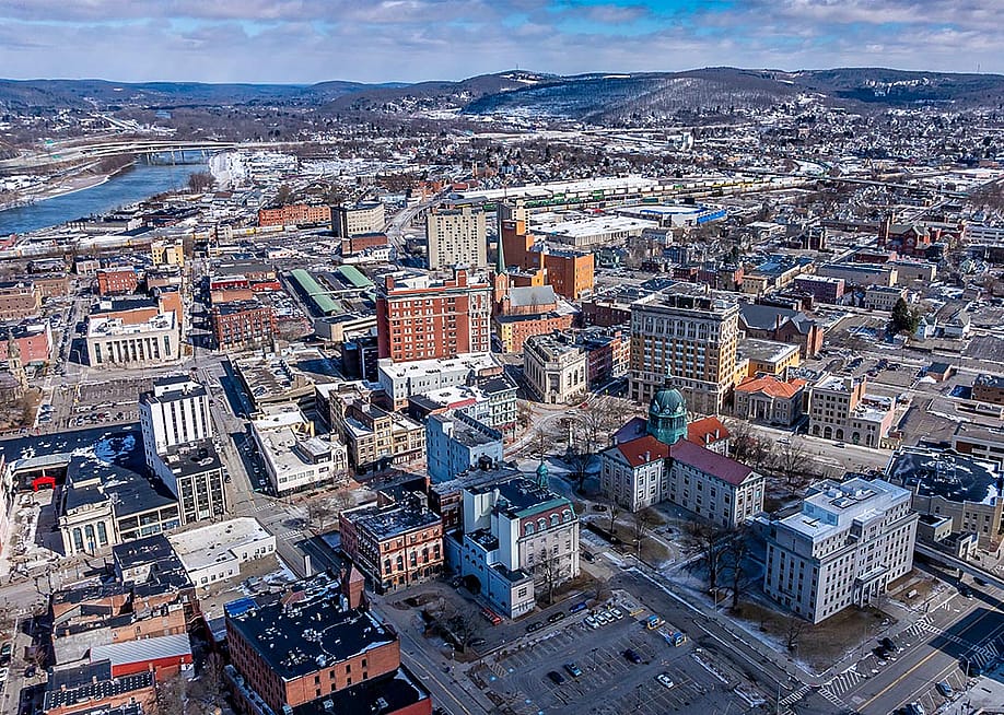 Winter afternoon aerial photo over downtown Binghamton, NY in March 2025. — TW Farlow Media // Shutterstock