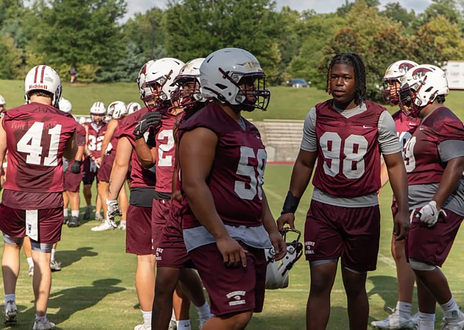 Roanoke College's football players during a practice drill. — Miles MacClure for The Hechinger Report