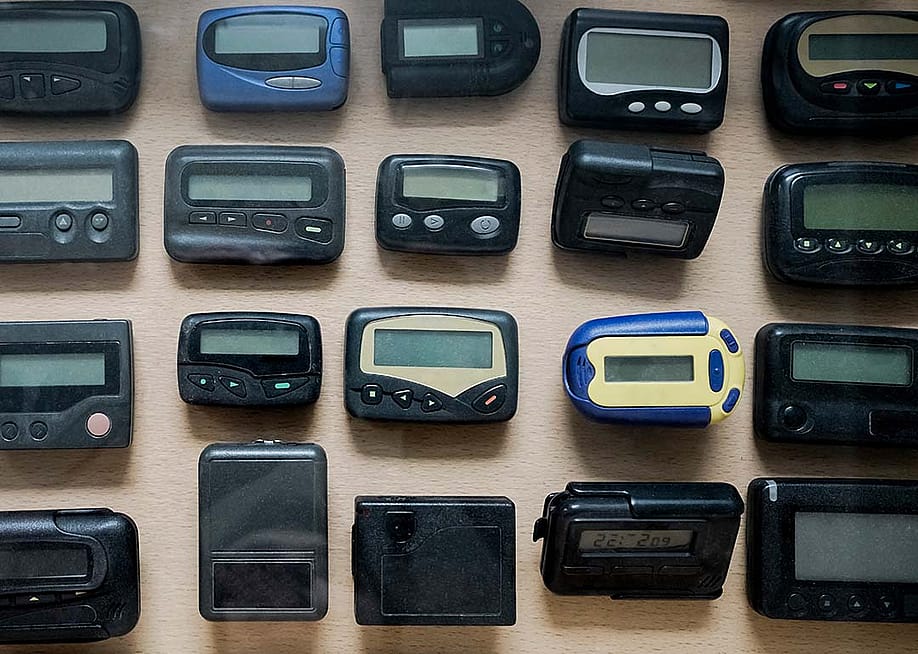 Various types and models of a pager (also known as beepers). — maradon 333 // Shutterstock