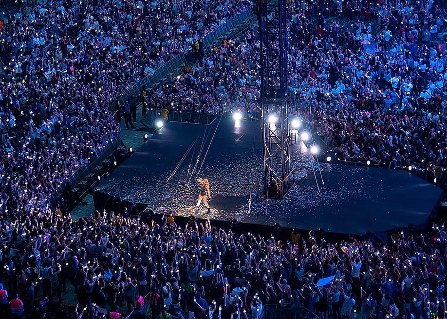 High-angle view above stage of Taylor Swift performing in concert at Wembley Stadium on June 23, 2018 in London, United Kingdom. — Christian Bertrand // Shutterstock