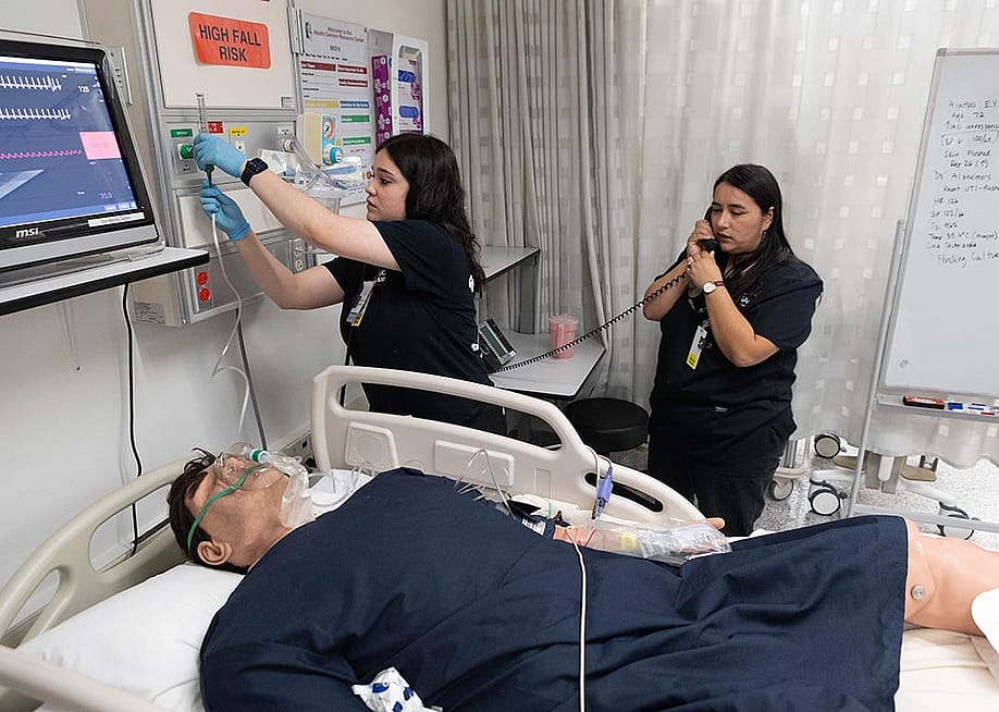 Students practice with a mannequin simulating a patient at the Mt. San Antonio College campus in California. — James Bernal for The Hechinger Report