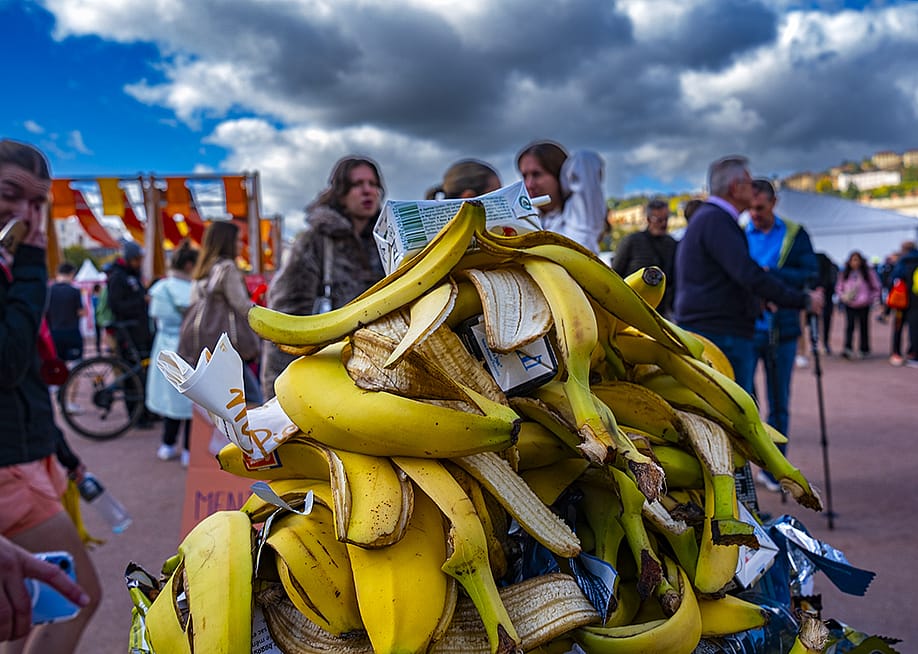 A pile of banana peels in the trash during a marathon in a city. — Robert DEYRAIL // Gamma-Rapho via Getty Images