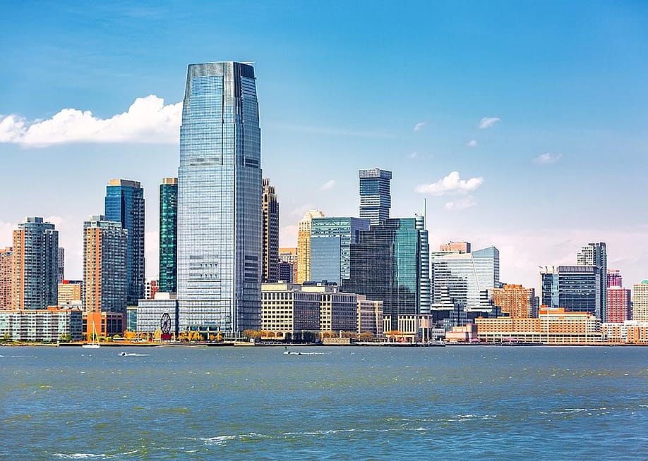 Jersey City skyline viewed from the Upper Bay. — Mihai_Andritoiu // Shutterstock
