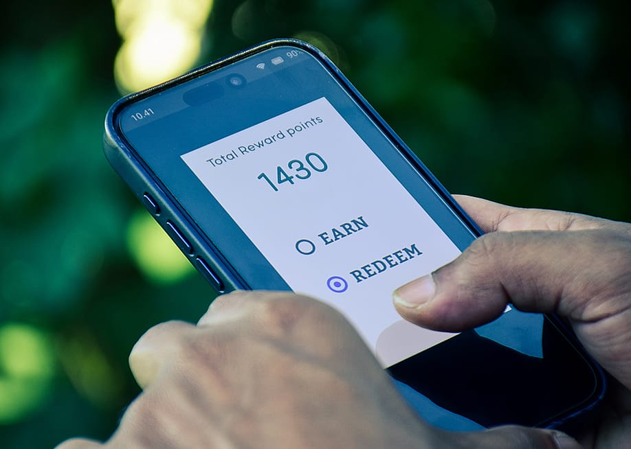A user checking to redeem reward points in a shopping app. — Linaimages // Shutterstock