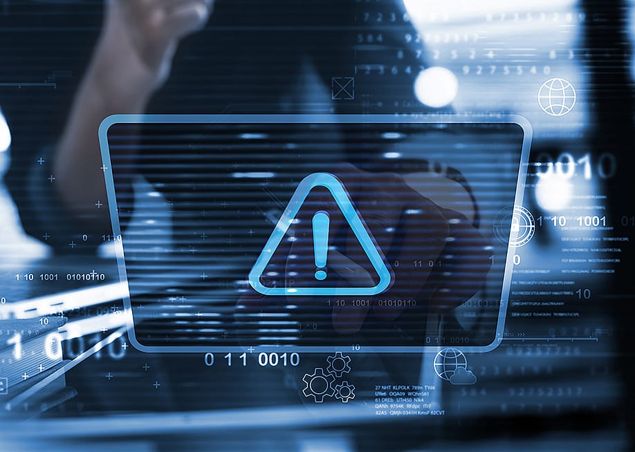 Cybersecurity software graphics displayed in front of a user. — TippaPatt // Shutterstock