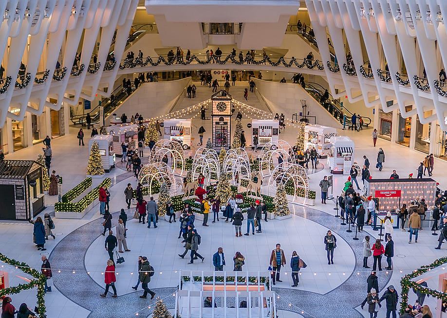 Christmas decorations fill the interior of a shopping mall in Manhattan, New York. — Heidi Besen // Shutterstock