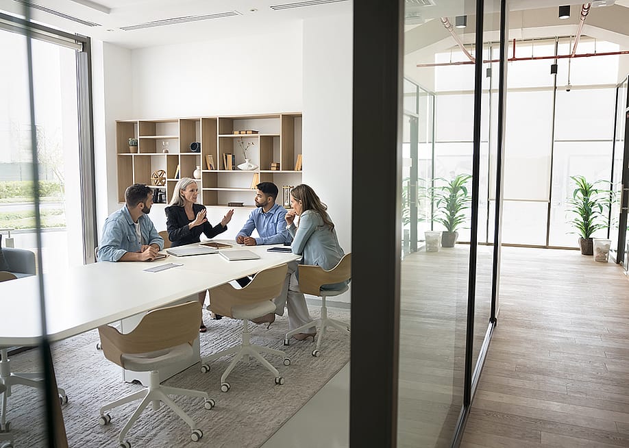 A team of managers in a meeting. — fizkes // Shutterstock