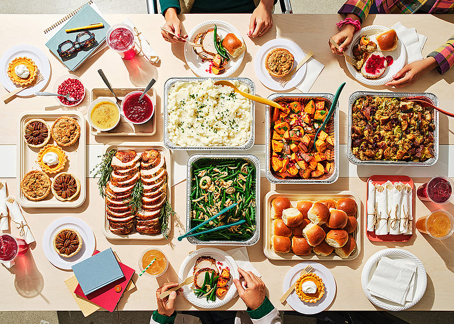 Various dishes for a holiday office party tablescape. — ezCater