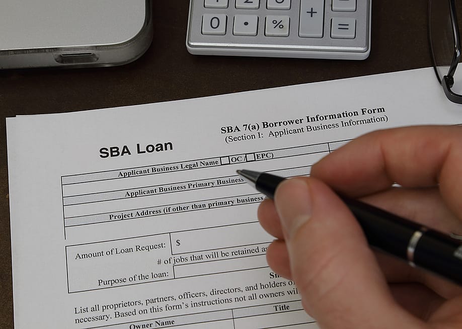 An SBA loan application form being filled out. — Kilmer Media // Shutterstock
