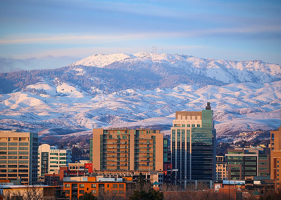 A view of the foothills and Bogus Basin Ski Resort in downtown Boise, Idaho. — CSNafzger // Shutterstock