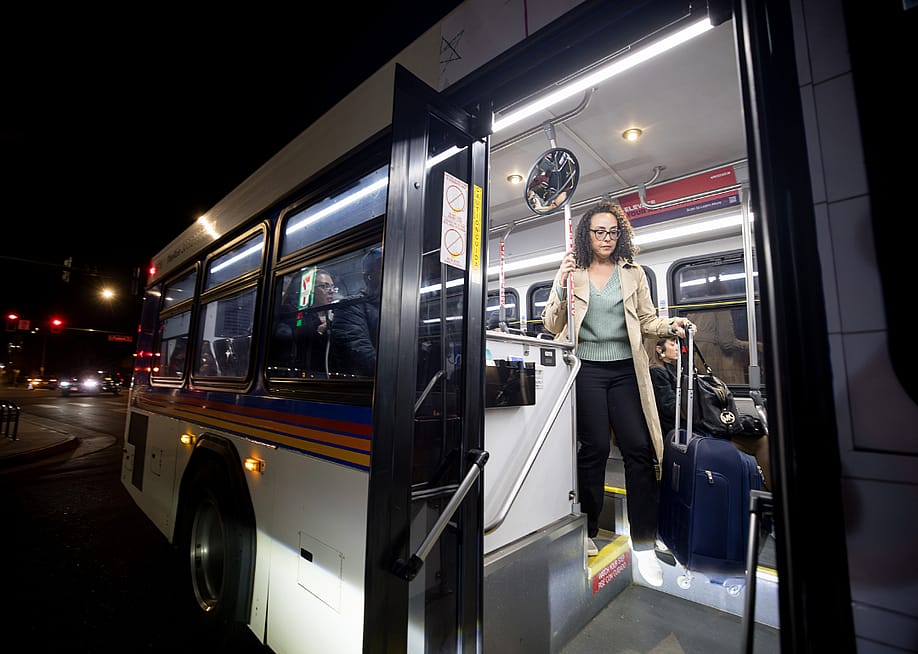 Cherri McKinney rides the bus home from her office in Denver using an EcoPass, a free monthly RTD pass, provided to Colorado state employees. — Sara Hertwig for The Hechinger Report