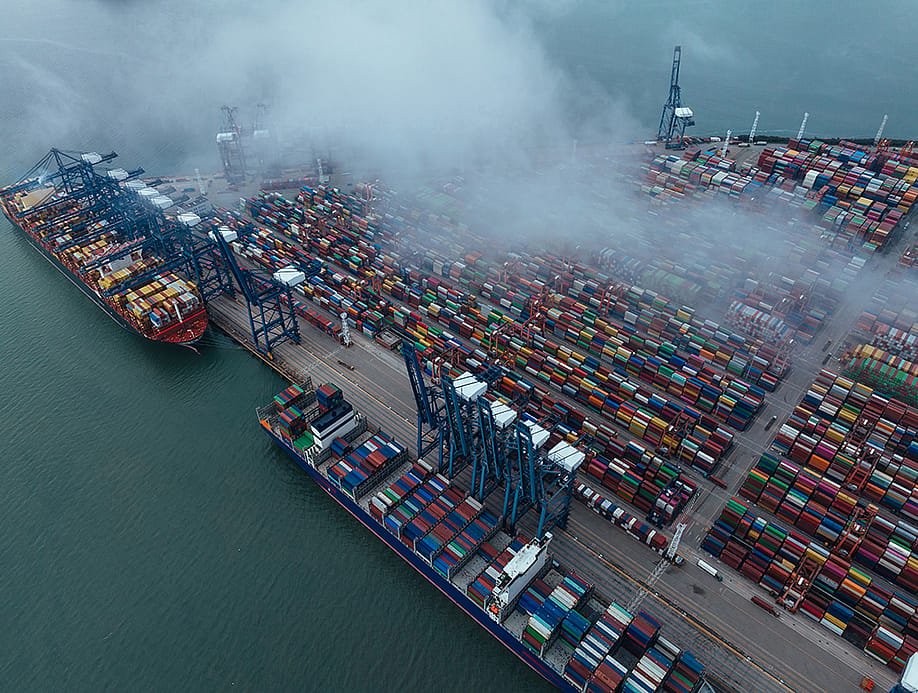 An aerial view of a cargo shipment terminal in China. — lzf // Shutterstock