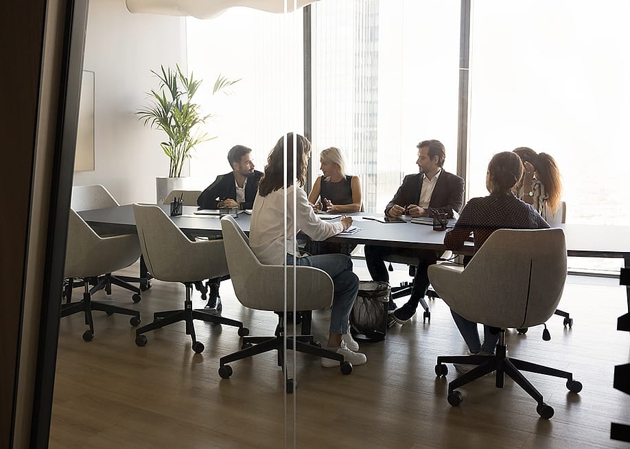 A business team having a meeting. — fizkes // Shutterstock