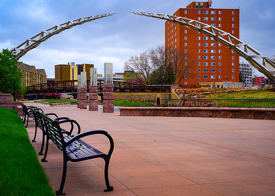 Boardwalk and benches along the Big Sioux River Trail in South Dakota. — NayaDadara // Shutterstock