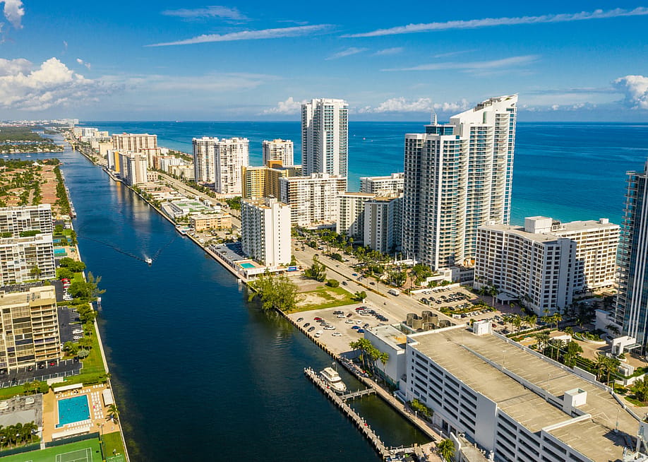 An aerial view of Hollywood Beach, Florida on a clear day. — Felix Mizioznikov // Shutterstock