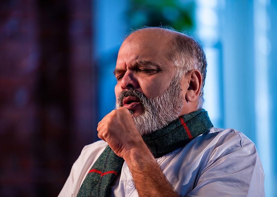 A senior man coughing. — StockImageFactory.com // Shutterstock