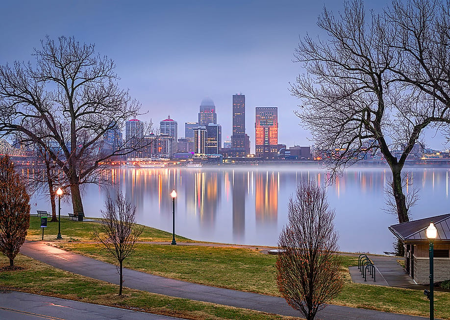 A foggy city view of the Ohio River in Louisville, Kentucky. — Wirestock Creators // Shutterstock