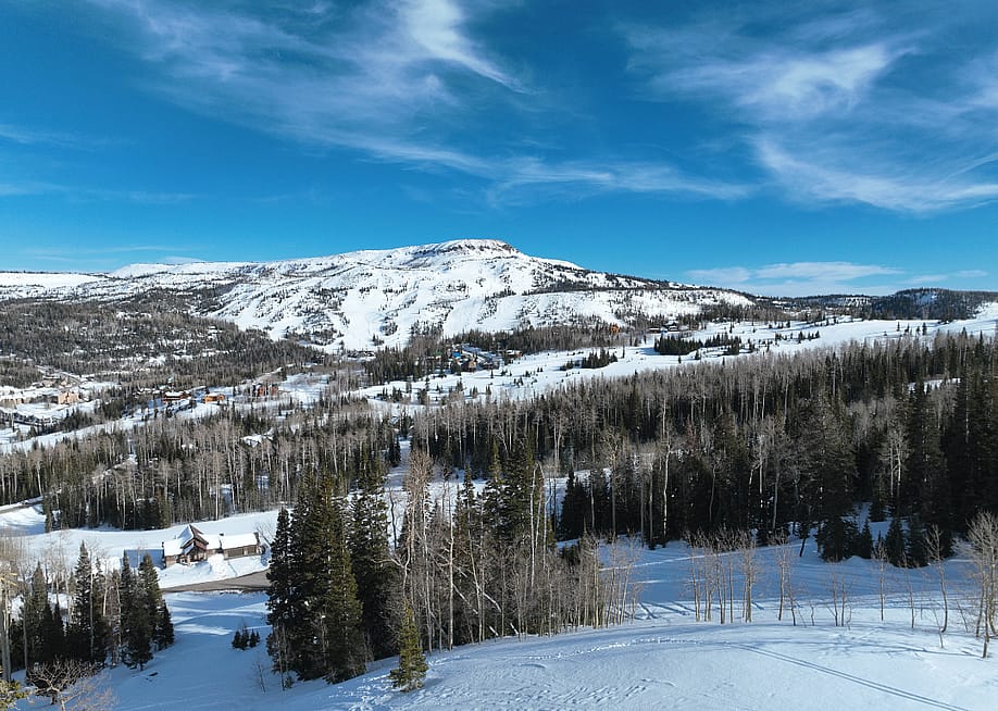 An aerial view of Brian Head ski resort in winter on a clear day. — Norm Diver // Shutterstock