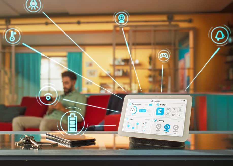 A unified home intelligence system device illustrated with apps and connectivity graphics with the homeowner in a living room as the background. — Gorodenkoff // Shutterstock
