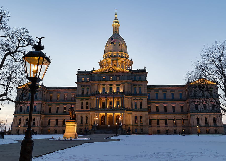 The facade of the State Capitol Building of Michigan in Lansing. — Jim_Brown_Photography // Shutterstock