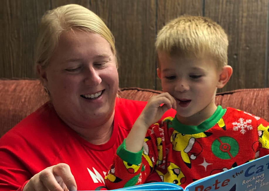 Jeana Wallace reading a book to her son, Levi, during bedtime. — Courtesy of Jeana Wallace