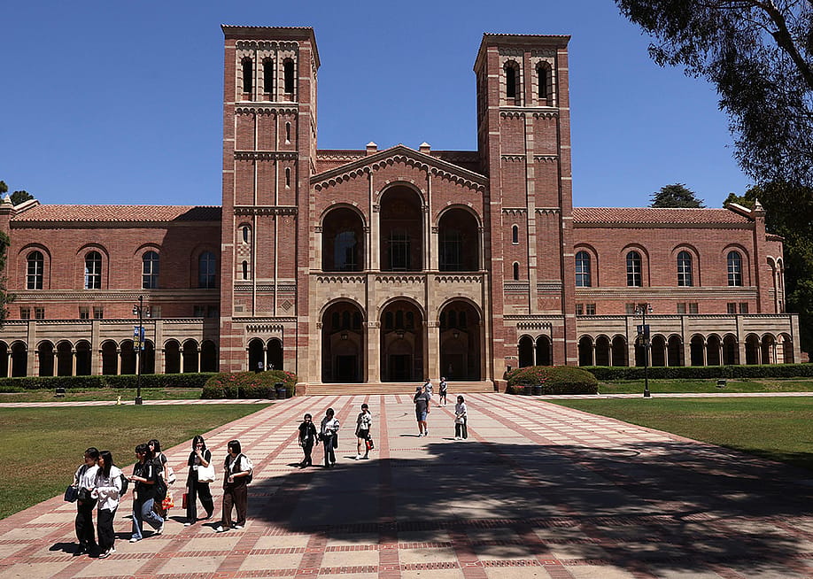 Students walking through Dickson Plaza by the Royce Hall on the UCLA campus in Westwood, California. — Genaro Molina // Los Angeles Times via Getty Images