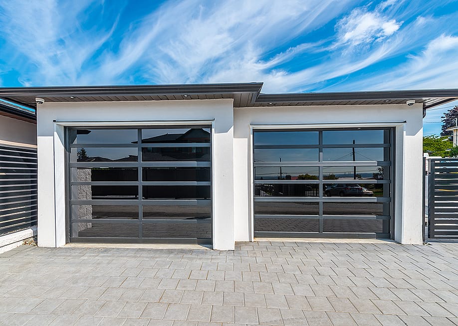 Garage doors of a modern home. — romakoma // Shutterstock