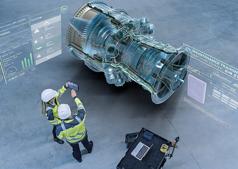 Aircraft engineers using augmented reality software for jet engine diagnostics. — Gorodenkoff // Shutterstock