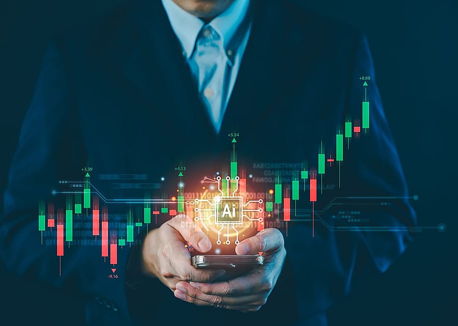 A businessman holding a phone illustrated with AI and stock chart graphics. — Jub ka Joy // Shutterstock
