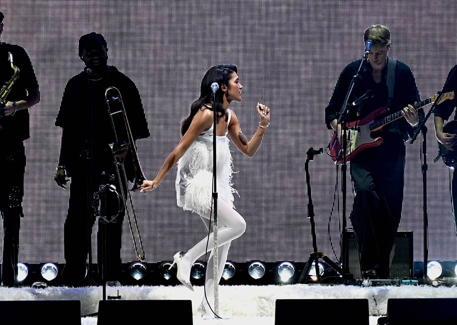 Singer Olivia Dean performs at Hot 99.5's iHeartRadio Jingle Ball 2025 at Capital One Arena, Washington, D.C. — Shannon Finney // Getty Images