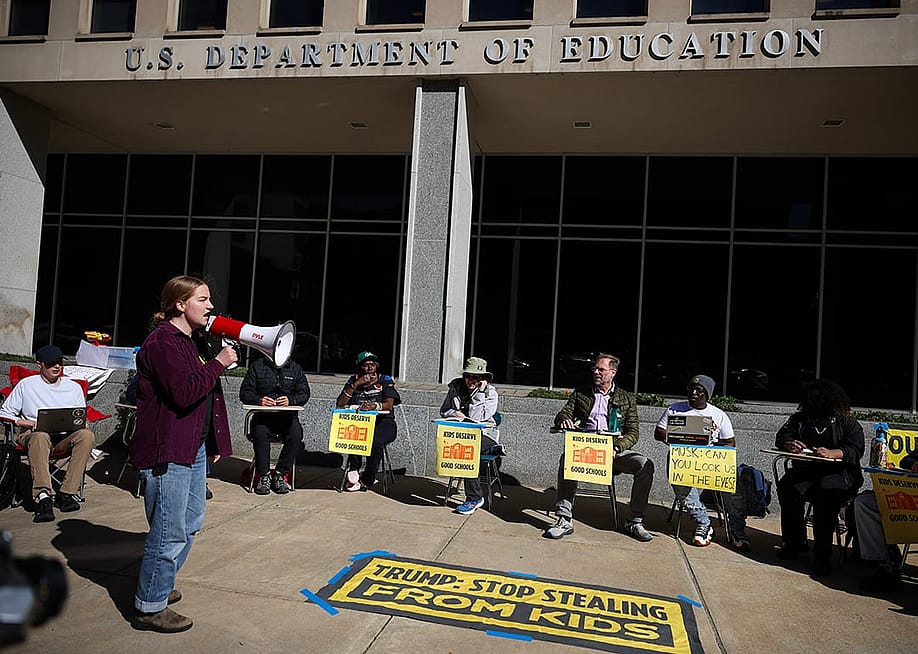 : Protestors participating in a 'study-in' in front of the US Department of Education building on March 21, 2025 in Washington, D.C. — Kayla Bartkowski // Getty Images