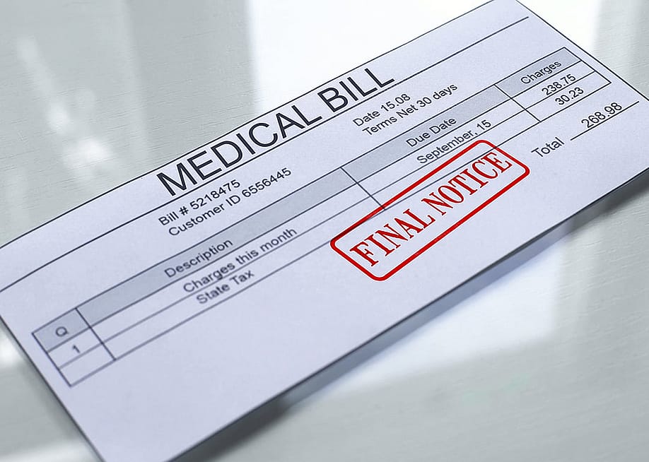 A medical bill with a final notice stamp. — Motortion Films // Shutterstock