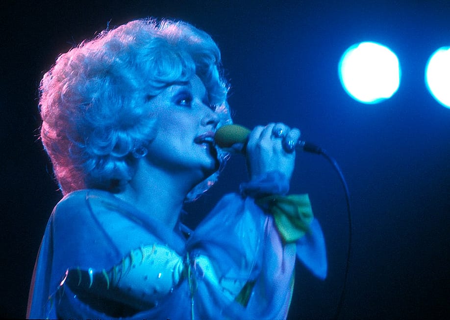 Dolly Parton during a 1978 concert in Théâtre Mogador in Paris, France. — Christian Rose // Roger Viollet via Getty Images