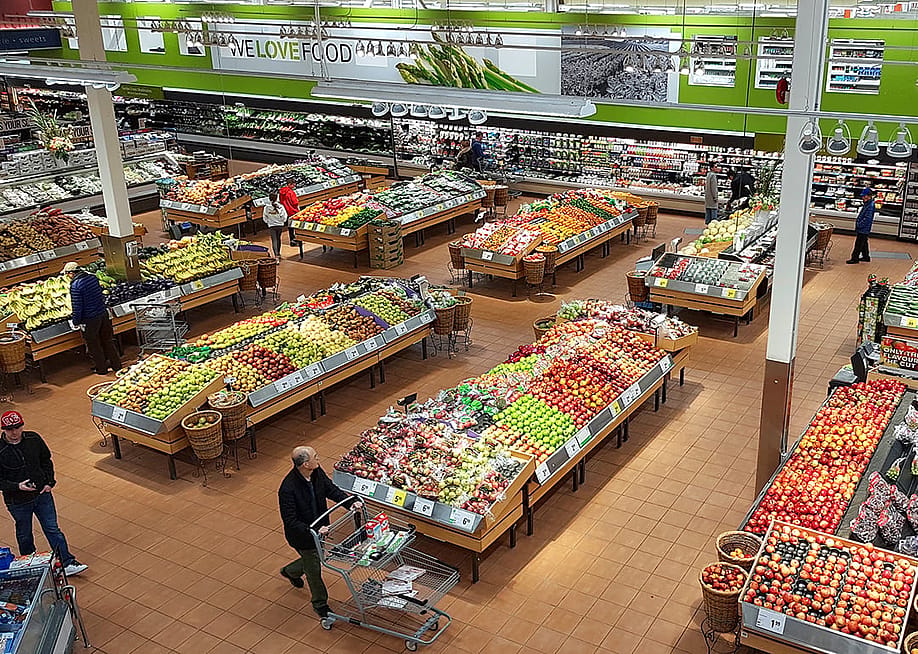 Top view of a large supermarket. — ValeStock // Shutterstock