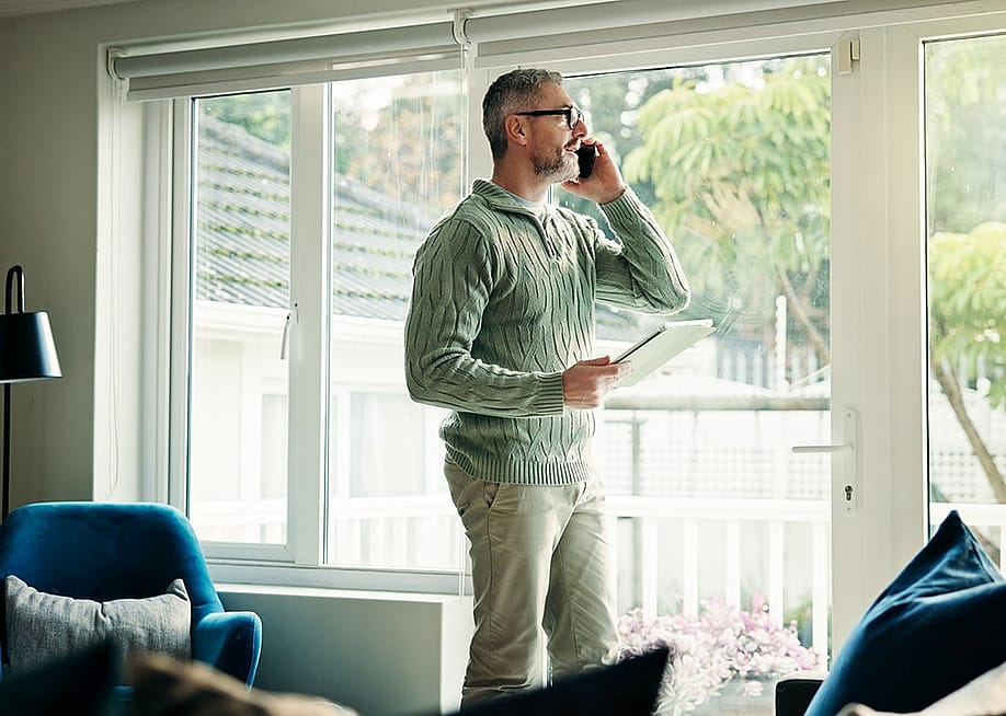 Man working from home engaged on a call. — PeopleImages // Shutterstock