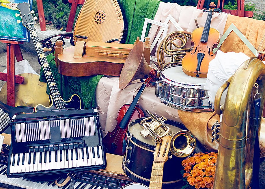 A pile of different musical instruments. — Afanasiev Andrii // Shutterstock