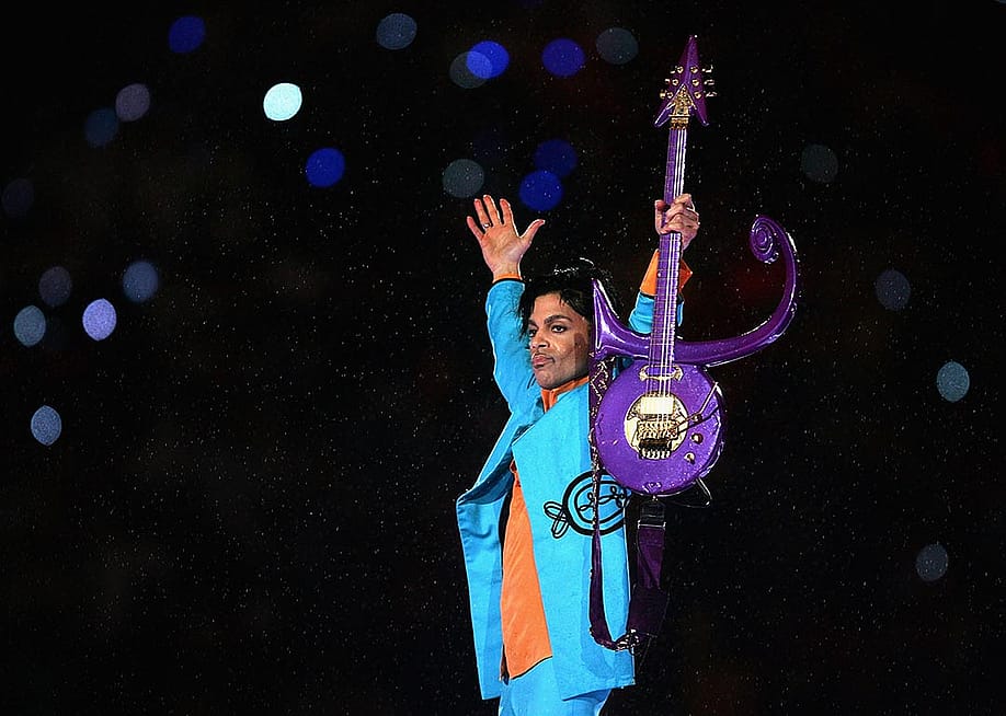 Prince on stage during the 'Pepsi Halftime Show' at Super Bowl XLI on February 4, 2007 at the Dolphin Stadium in Florida. — Jonathan Daniel // Getty Images