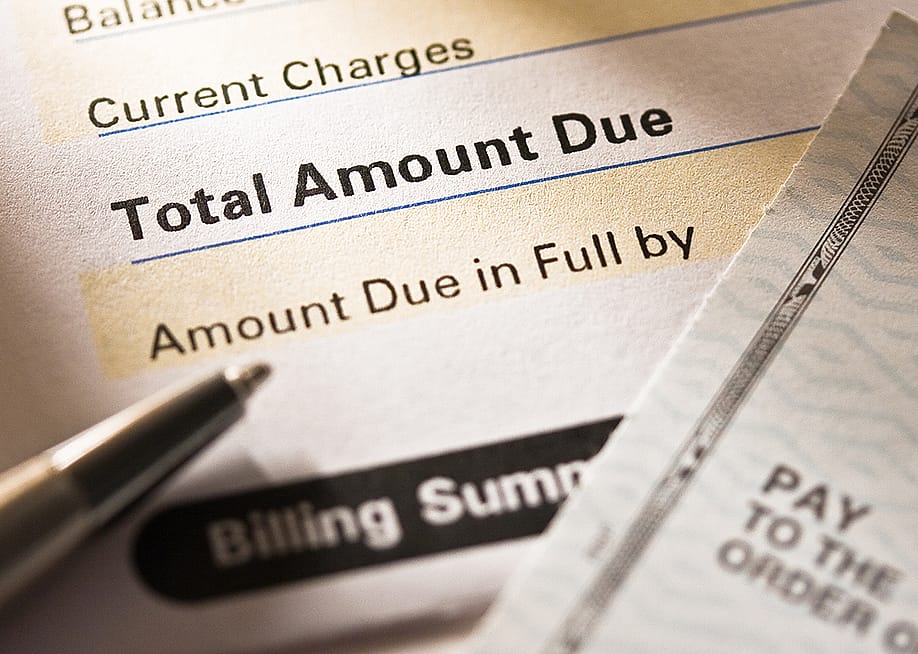 Close up on the total amount due of a bill. — photastic // Shutterstock