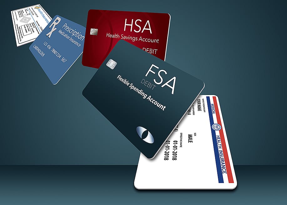 3D illustration of a row of HSA, FSA, discount cards. — robertindiana // Shutterstock
