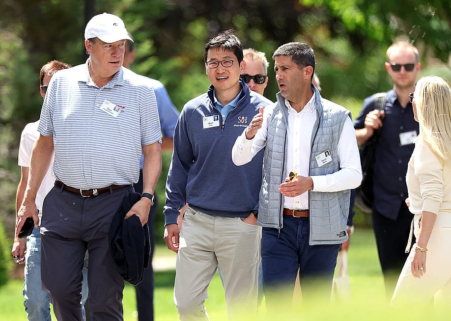 Bom Kim (center), founder and CEO of Coupang, walks with investor Stan Druckenmiller and member of the Federal Reserve Board of Governors Kevin Warsh during the Allen & Company's annual Sun Valley Conference on July 13, 2023 in Sun Valley, Idaho. — Kevin Dietsch // Getty Images