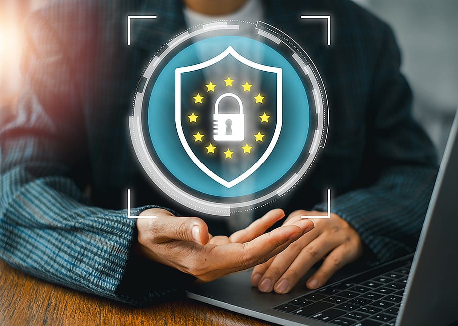 Concept of GDPR and data privacy represented by a digital lock and shield. — Mongta Studio // Shutterstock