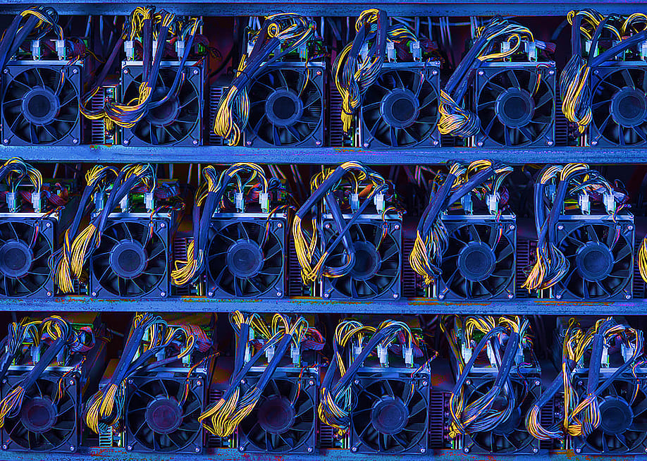 Fans powering a cryptocurrency farm. — Mark Agnor // Shutterstock