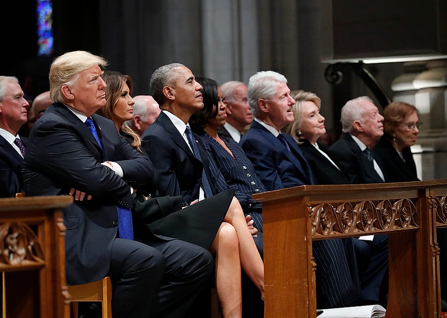 From left, President Donald Trump, first lady Melania Trump, former President Barack Obama, former first lady Michelle Obama, former President Bill Clinton, former Secretary of State Hillary Clinton, and former President Jimmy Carter and former first lady Rosalynn Carter, listen as former President George W. Bush speaks during the state funeral for former U.S. President George H. W. Bush at the Washington National Cathedral on December 5, 2018 in Washington, D.C. — Alex Brandon // Pool - Getty Images