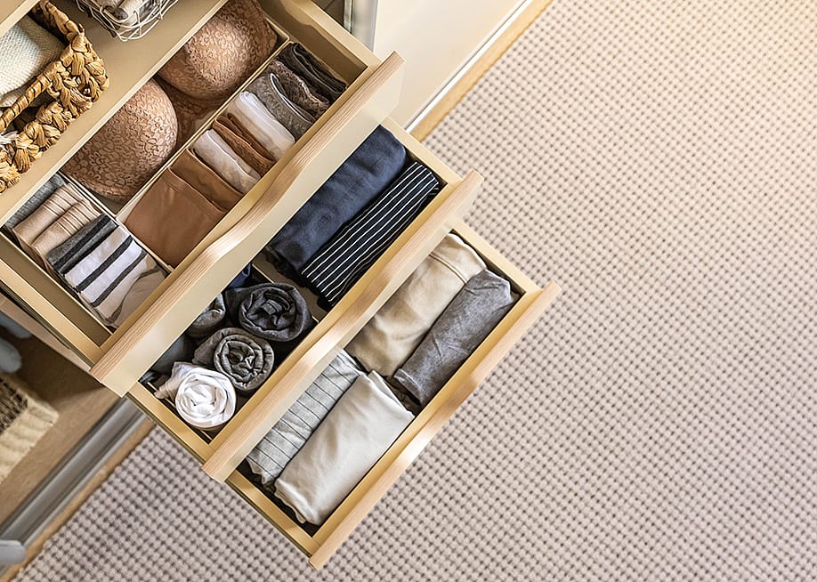 Opened chest drawers storing underwear. — Kostikova Natalia // Shutterstock