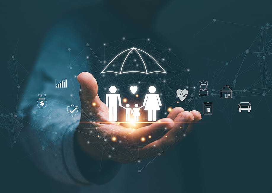 Person's hand holding hologram graphics of a family with an umbrella as a concept of life insurance. — krungchingpixs // Shutterstock