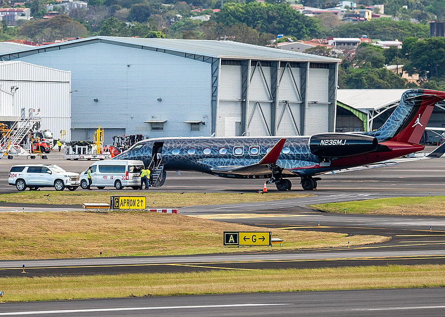 Former NBA Player Michael Jordan onboarding his custom plane N236MJ at Juan Santamaria International Airport in Costa Rica. — juanpabloms // Shutterstock